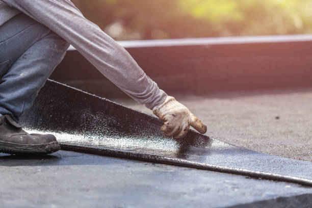 Professional Basement Waterproofing technician working in Axis, AL